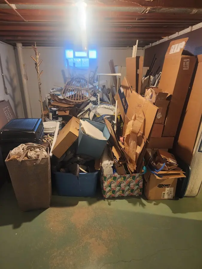 Roll-off dumpster container at job site for Concrete Dumpster Rental in Greendale